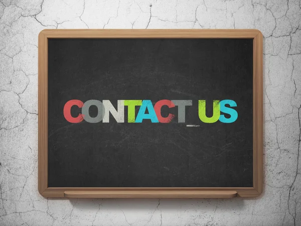 Business concept: Contact us on School Board background — 图库照片