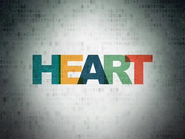 Концепція здоров'я: серце на фоні цифрового паперу — стокове фото