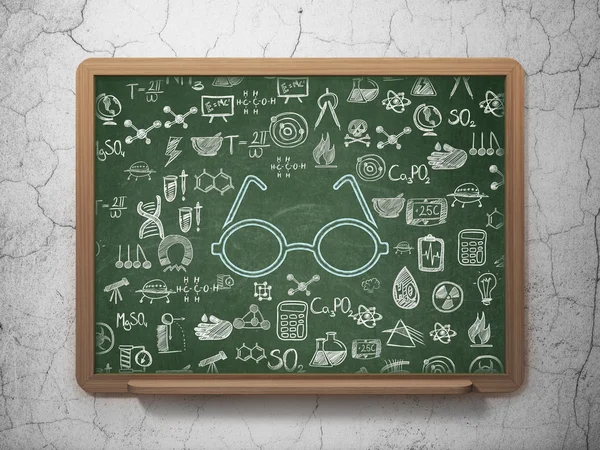 Science concept: Glasses on School Board background — Stockfoto