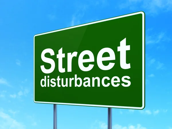 Politics concept: Street Disturbances on road sign background — Stock Photo, Image