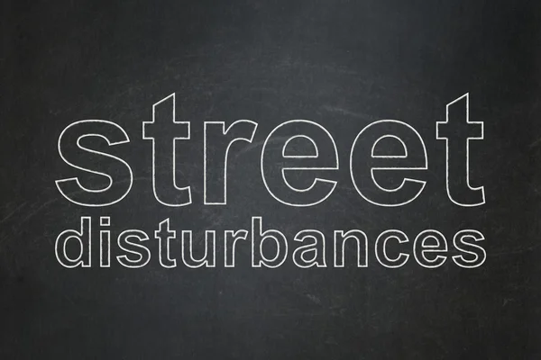 Political concept: Street Disturbances on chalkboard background — Stockfoto