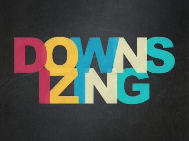 Business concept: Downsizing on School Board background