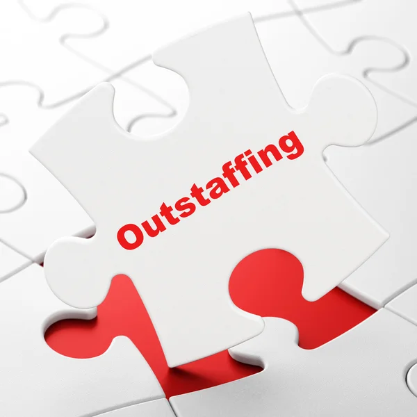 Business concept: Outstaffing on puzzle background — Stock fotografie