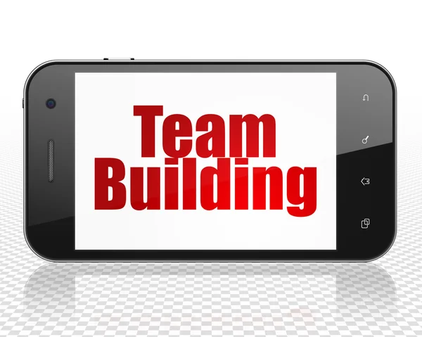 Finance concept: Smartphone with Team Building on display — Stock fotografie