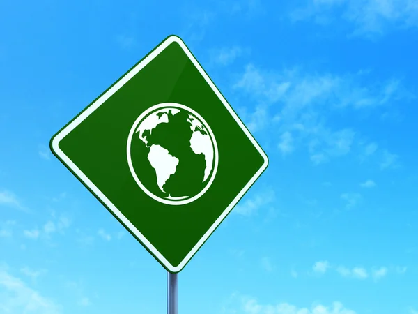 Studying concept: Globe on road sign background — 图库照片