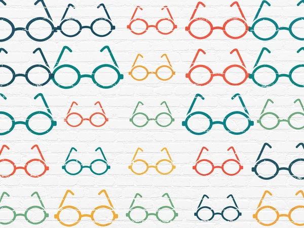 Education concept: Glasses icons on wall background — Stockfoto