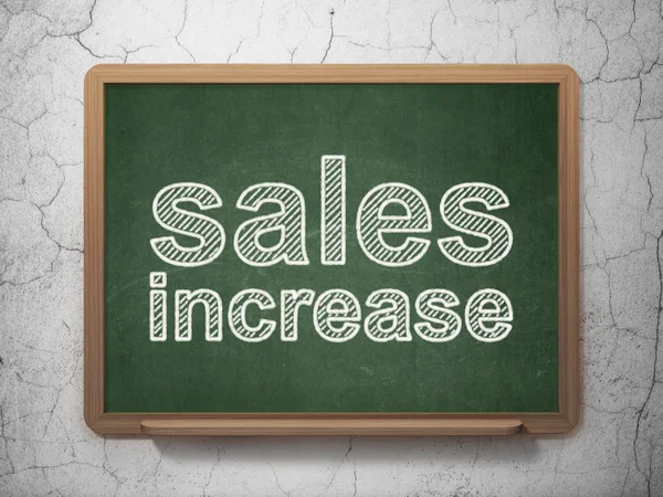 Concepto publicitario: Aumento de ventas en el fondo de pizarra —  Fotos de Stock