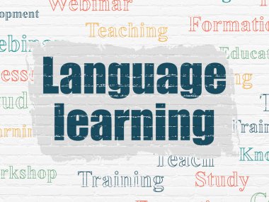 Eğitim kavramı: duvar arka plan üzerinde dil öğrenme