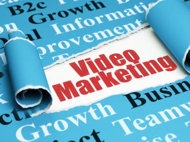 Finance concept: red text Video Marketing under the piece of  torn paper