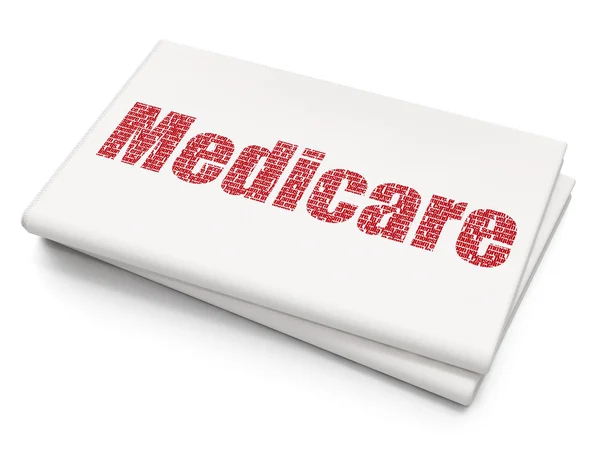 Geneeskunde concept: Medicare op lege krant achtergrond — Stockfoto