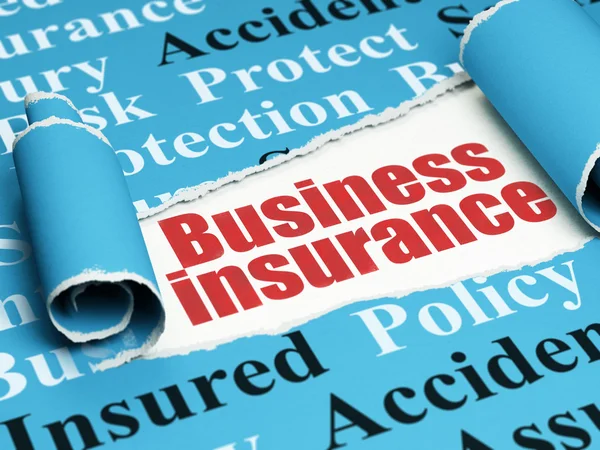 Концепция страхования: красный текст Страхование бизнеса под разорванным листом бумаги — стоковое фото