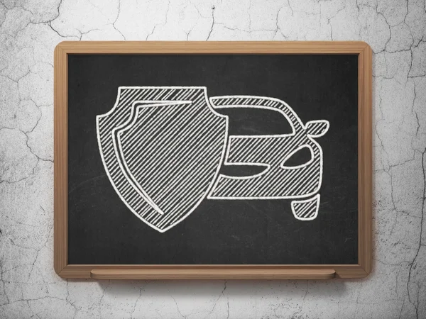 Insurance concept: Car And Shield on chalkboard background — Stockfoto