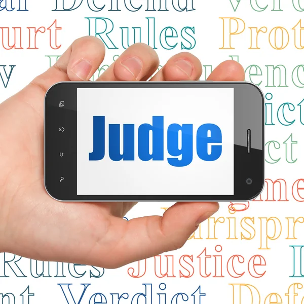 Law concept: Hand Holding Smartphone with Judge on display — Stock Photo, Image