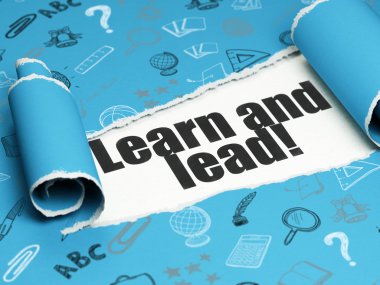 Studying concept: black text Learn and Leadunder the piece of  torn paper