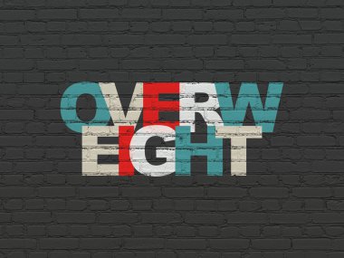 Health concept: Overweight on wall background