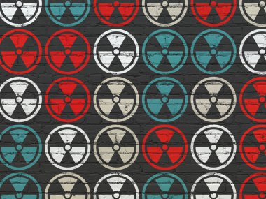 Science concept: Radiation icons on wall background