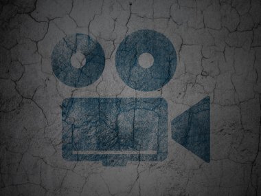 Tourism concept: Camera on grunge wall background