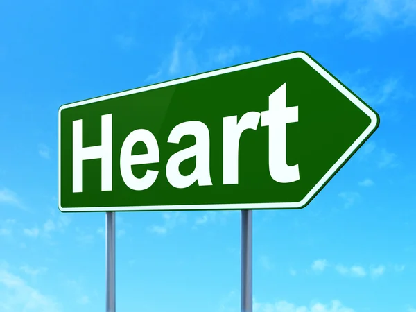 Medicine concept: Heart on road sign background — Stock Photo, Image