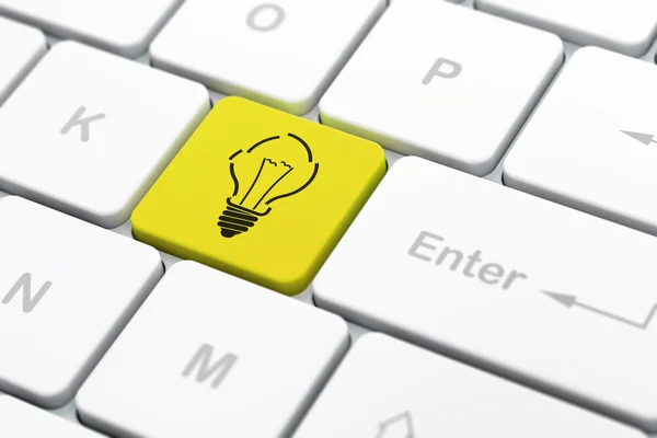 Business concept: Light Bulb on computer keyboard background — Stock Photo, Image