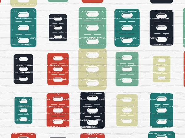 Healthcare concept: Pills Blister icons on wall background — Zdjęcie stockowe