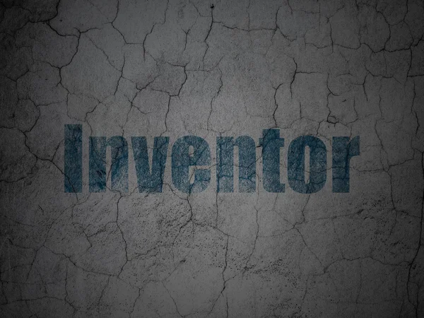 Science concept: Inventor on grunge wall background — Stok fotoğraf