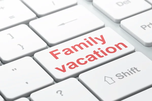 Tourism concept: Family Vacation on computer keyboard background