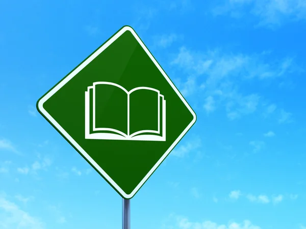 Science concept: Book on road sign background — Stock Photo, Image