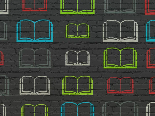 Studying concept: Book icons on wall background — Stockfoto