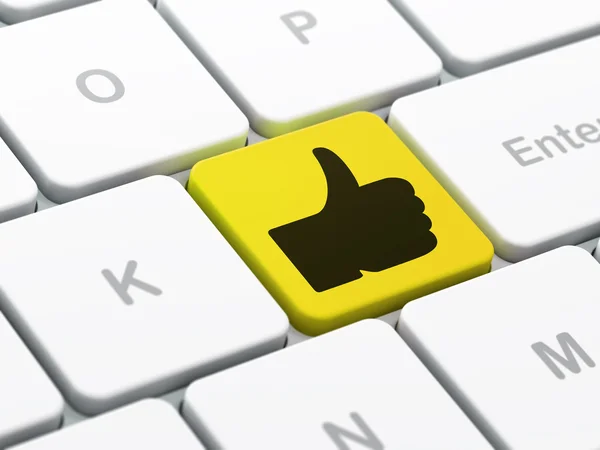 Sociale media concept: duim omhoog op computer toetsenbord achtergrond — Stockfoto