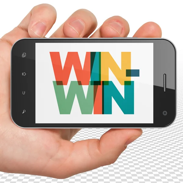 Finance concept: Hand Holding Smartphone with Win-Win on  display — Stock Photo, Image