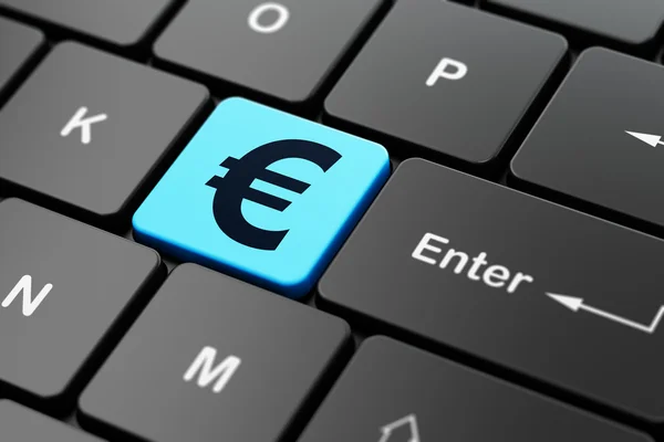 Concepto de dinero: Euro en el fondo del teclado del ordenador — Foto de Stock