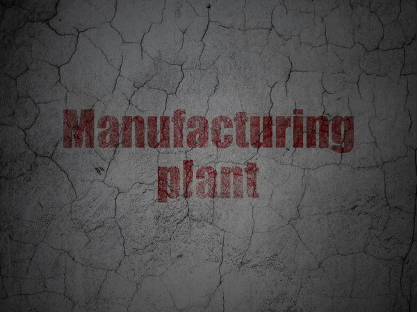 Manufacuring koncept: výrobní závod na pozadí zeď grunge — Stock fotografie
