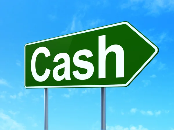 Currency concept: Cash on road sign background — Stok fotoğraf