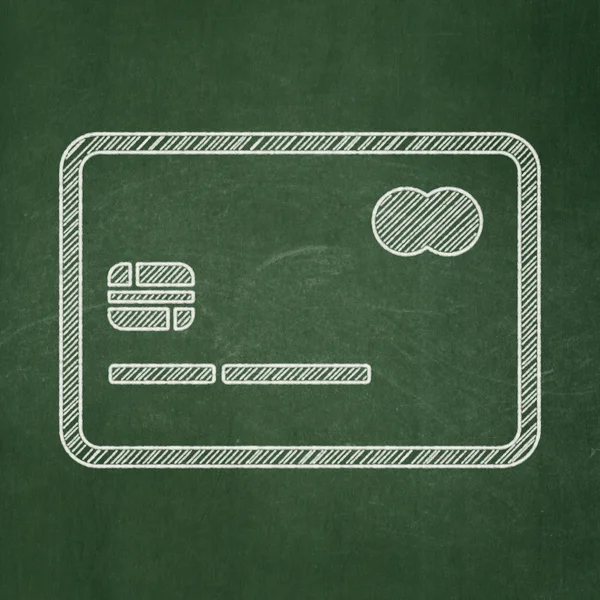 Conceito de dinheiro: Cartão de crédito sobre fundo quadro-negro — Fotografia de Stock