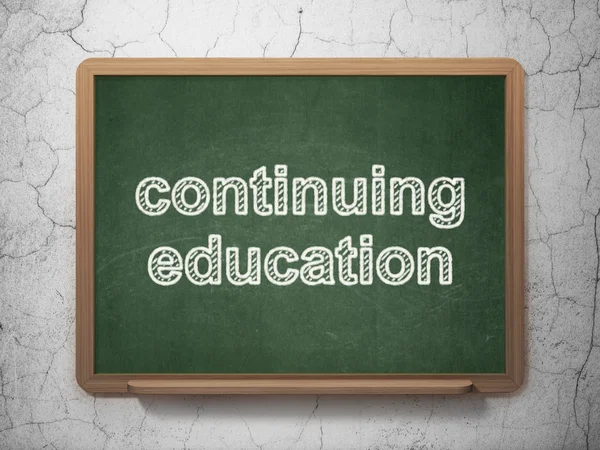 Learning concept: Continuing Education on chalkboard background — Stock Photo, Image