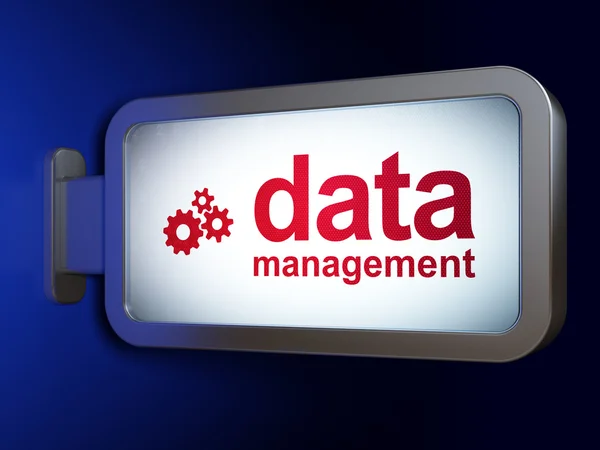 Datenkonzept: Datenmanagement und Zahnräder auf Plakatwand-Hintergrund — Stockfoto