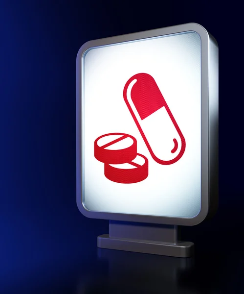 Medicine concept: Pills on billboard background — Stock Photo, Image
