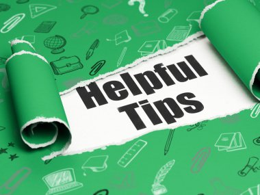 Learning concept: black text Helpful Tips under the piece of  torn paper