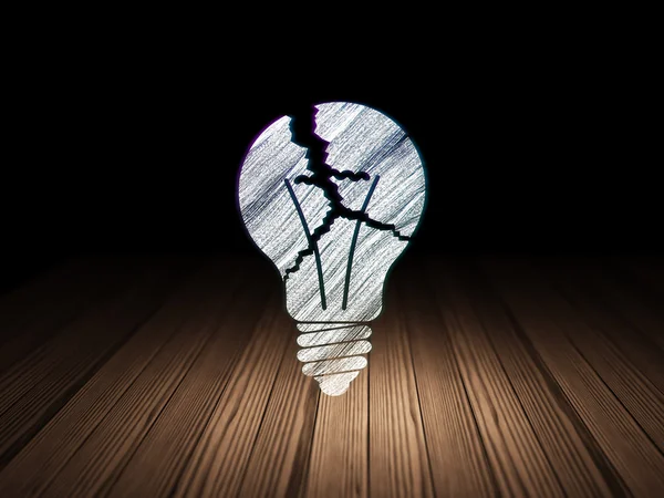 Finanční koncept: žárovka v temné místnosti grunge — Stock fotografie