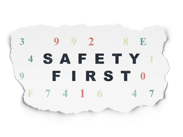 Concept de protection : Safety First sur fond de papier déchiré — Photo