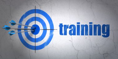 Learning concept: target and Training on wall background