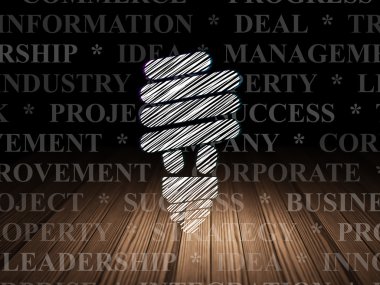 Ekonomi kavramı: grunge karanlık odada enerji tasarrufu lamba