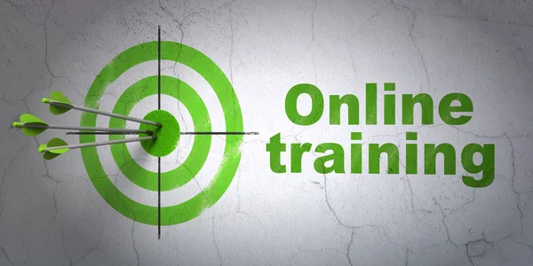 Learning concept: target and Online Training on wall background — Stock Photo, Image