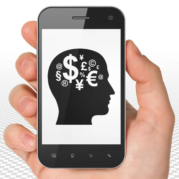 Conceito de negócio: mão segurando Smartphone com cabeça com símbolo de finanças em exposição — Fotografia de Stock
