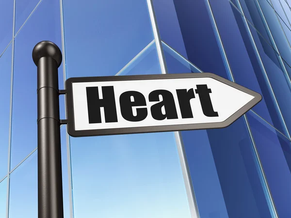 Концепція охорони здоров'я: знак Серце на будівельному тлі — стокове фото