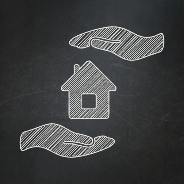 Insurance concept: House And Palm on chalkboard background — ストック写真