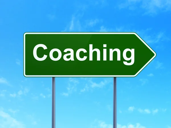 Studying concept: Coaching on road sign background — 图库照片
