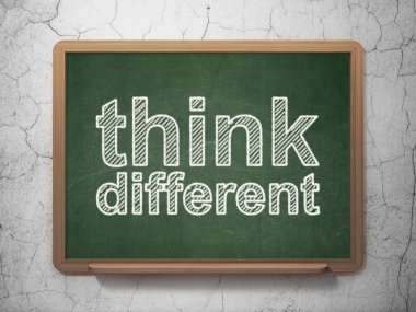 Education concept: Think Different on chalkboard background