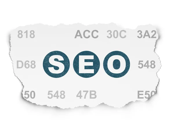 Concepto de desarrollo web: SEO en antecedentes de Torn Paper —  Fotos de Stock