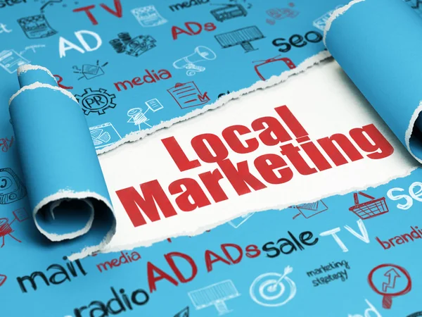 Marketing concept: red text Local Marketing under the piece of  torn paper